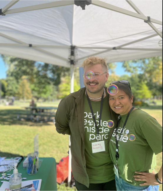Two people wearing a Park People shirt