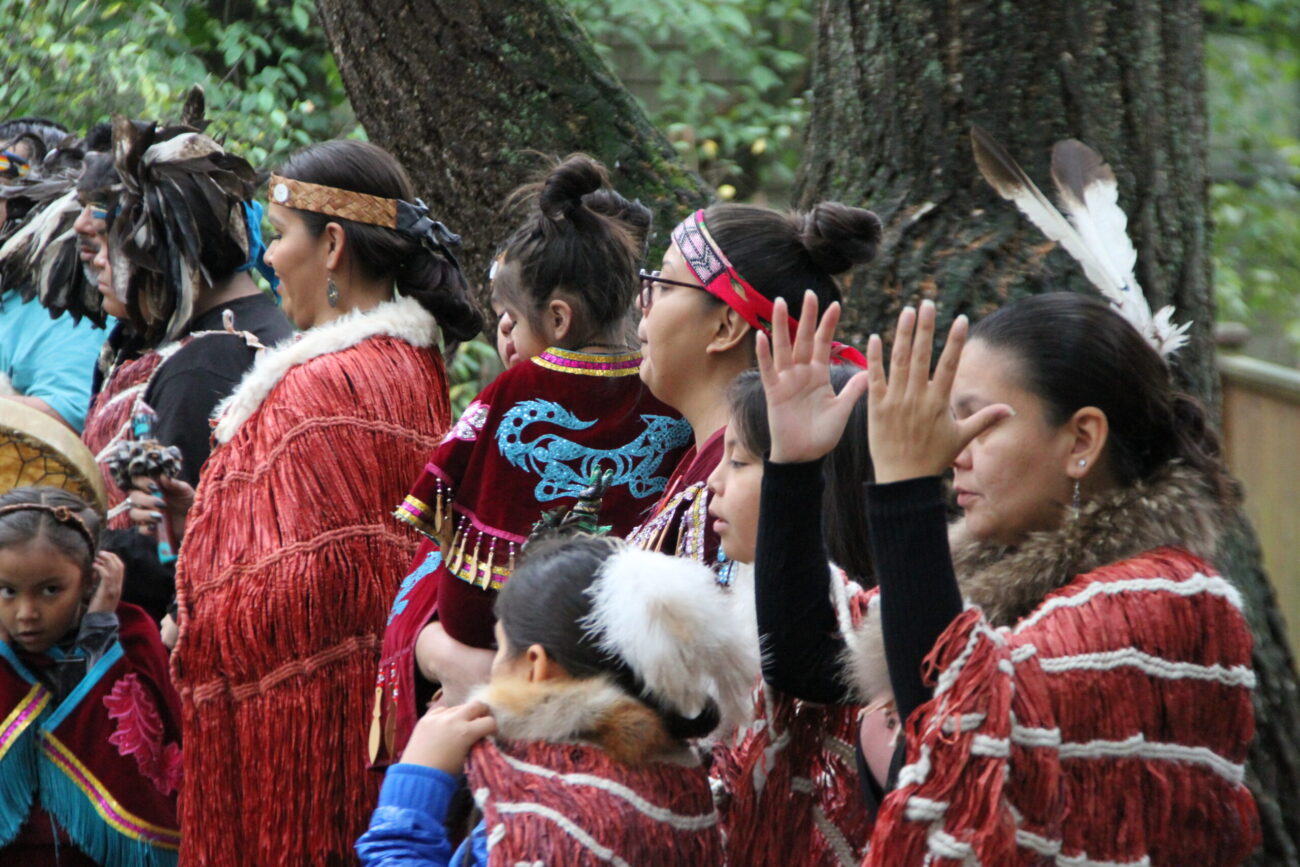 First nation performers with traditional clothes